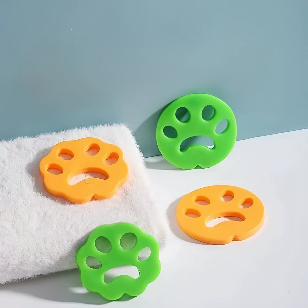 Pack de 4 atrapa-pelos de silicona para lavadora